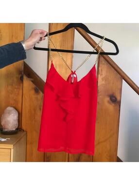 Red tank top with gold chain detail. dizzy lizzy size small